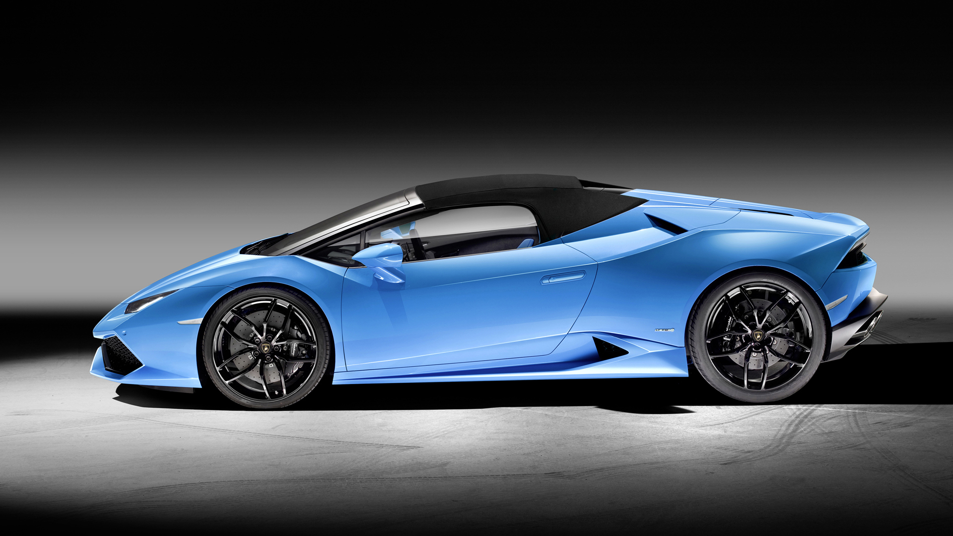 2017 Lamborghini Huracán LP 610-4 Spyder side profile with roof up